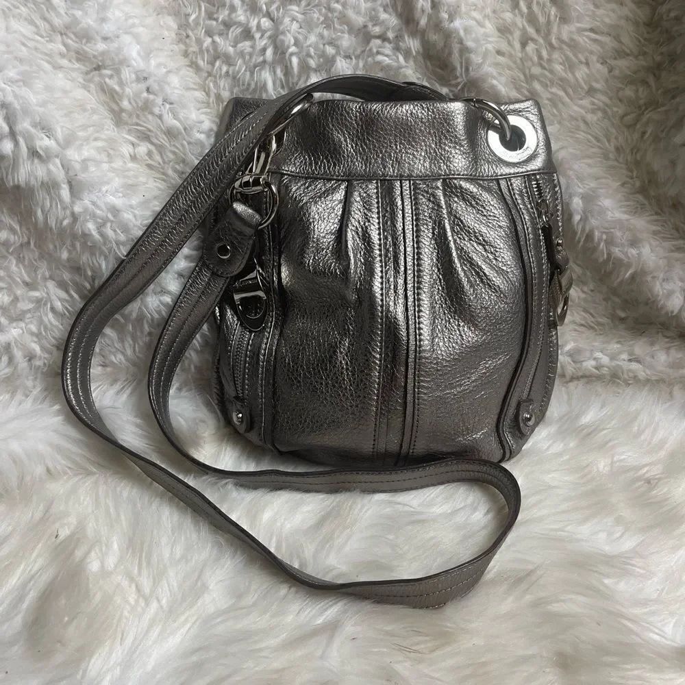 B Makowsky pebble soft leather metallic silver shoulder/ crossbody bag .
